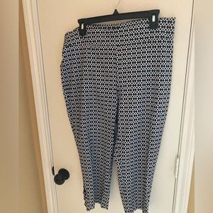 Cute Capri pants! BRAND NEW without tags Black and White w/leg cut outs design.